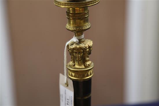 A pair of Empire style bronzed ormolu candlesticks, 10.5in.